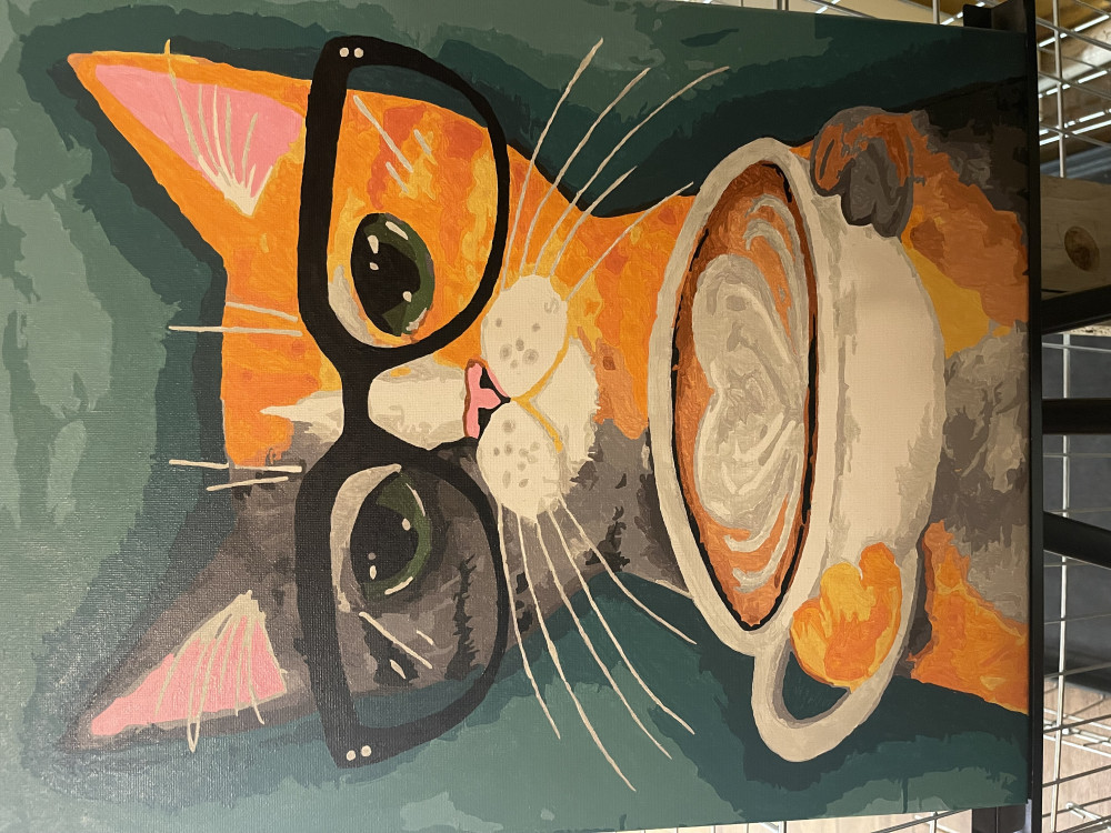     Kávézó macska - Számos kifestő keretre feszítve (40x50 cm)